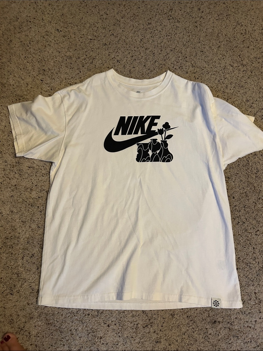 Nike White Kids Graphic Swoosh Tee with Floral Motif